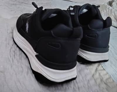 “Brand New Black Sneakers – Unused Condition”