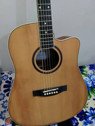 Like a brand new Jumbo Guitar excellent quality clear sound urgent