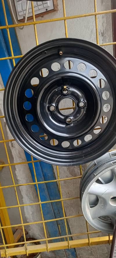 Honda City genuine Rims 4 nuts  brand new with genuine wheels covers