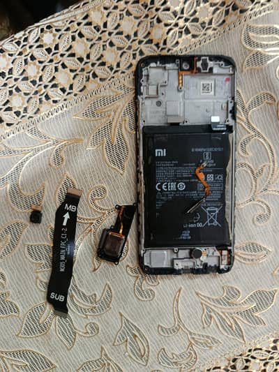 Redmi note 10 parts panel battery speakers etc.