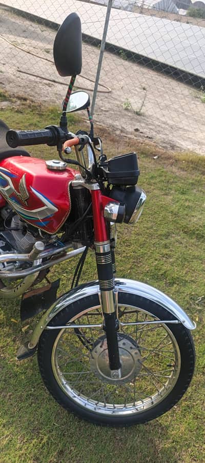 Honda 125 red color for sale urgently total genuine lush condition