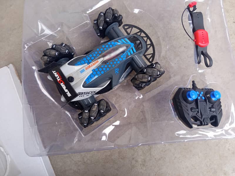 بچوں کی ریموٹ اور واچ کنٹرول والی گاڑی 9