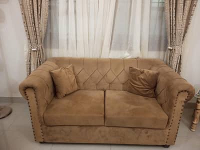 Seven-seater sofa set with centre table.