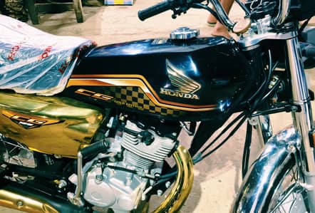 0325-5561104     Honda special edition gold 2024