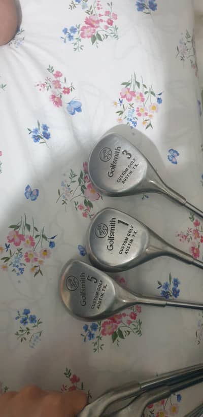 golf Smith golf clubs ( number 5,1,7 ) and tour model  irons s,3,6,4