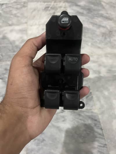 Civic door master button