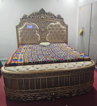 bed and 2 side table and dressing table