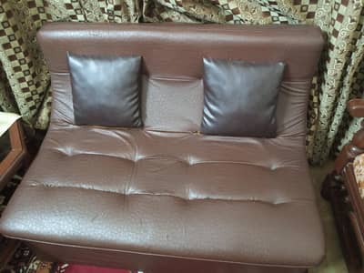 2 seater sofa . brown colour condtion ok