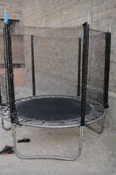 Round Jumping Trampoline with Safety Net – Good Condition