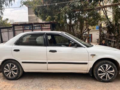 white Suzuki baleno JXR 2003