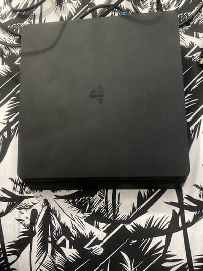 PlayStation 4  (almost in a new condition)