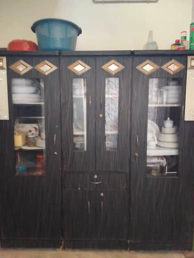 cupboard divided into 3 pieces