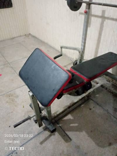 jym multi functional bench press bar and 38 kg plates