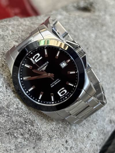 Longines Conquest Automatic Ceramic bezel.