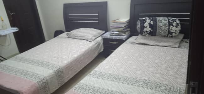 2 single beds with matress