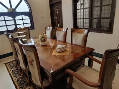 Dining table with Eight chairs