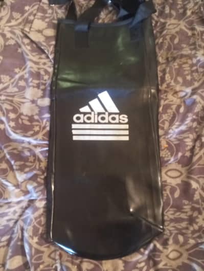 new adidas punching bag with Venum gloves