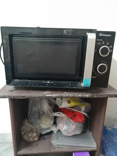 Dawlance microwave DW-374 /cheap price/only Glass proken/Urgent Sale
