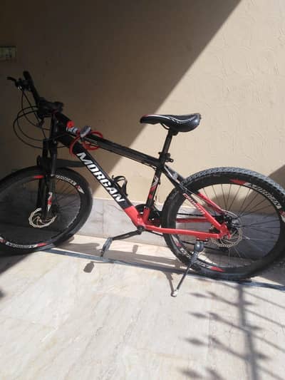 red and black colour Morgan cycle