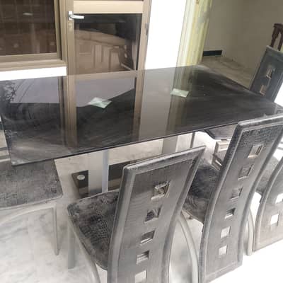 Glass table with 6 chairs
