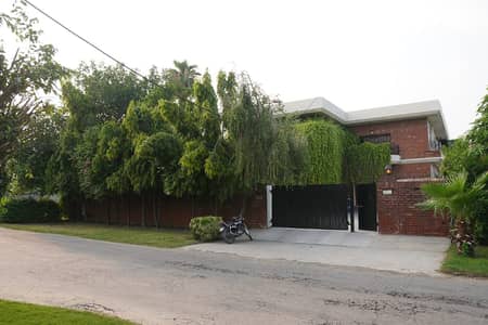 70 Marla Corner Used Modern Design 2 Gates 10 Bed Rooms Separate Entrance Bungalow For Sale At Prime Location Of DHA Lahore Best For 2 Families
