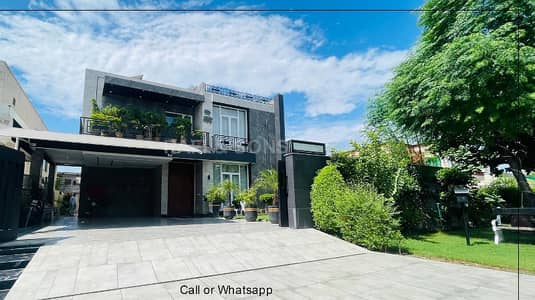 One Kanal Slightly Used Ultra-Modern Designer Bungalow 10 KV Solar Atached For Sale At Prime Location Of DHA Lahore