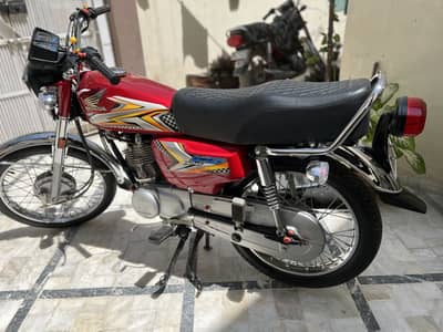 Urgent sell Honda 125 red new