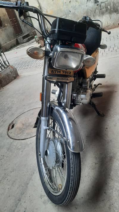 125 self gold edition