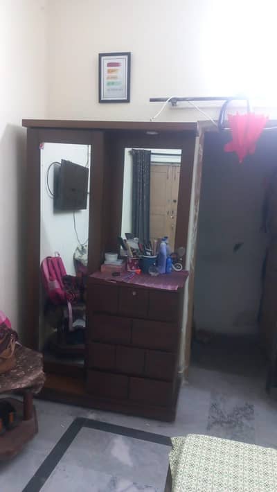 Bed with side tables and dressing