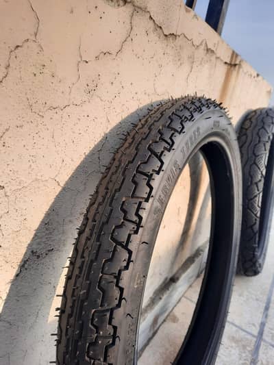 Honda 125 brand new front and rear servis tyres.
