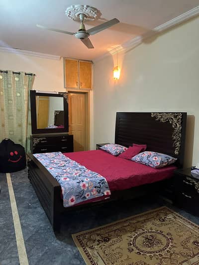 King size wood bed (new condition)