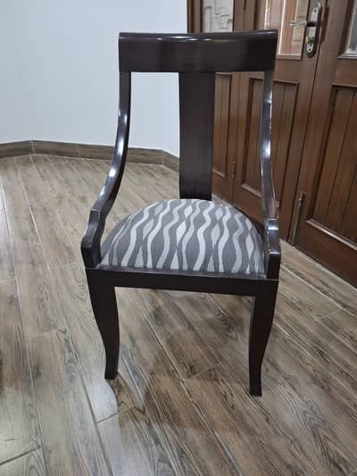 Glass top dinning table with 8 chairs