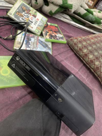 Xbox 360 non JTag ulta slim 2014 model with 6 original Xbox 360 games