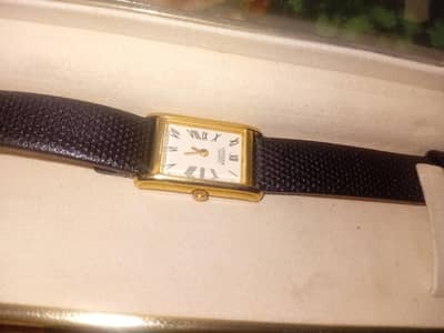 vintage CITIZEN _EK2892_06A  womans watch gold tone Tank style Roman. .