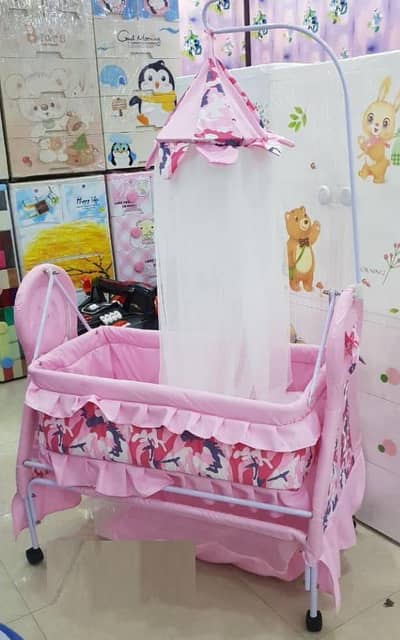 pink baby swing with mosquito net and foam pad
