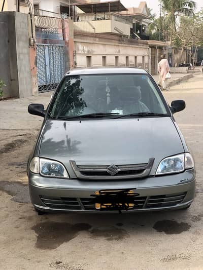 Suzuki Cultus 2014 smoke green AC working Home used car