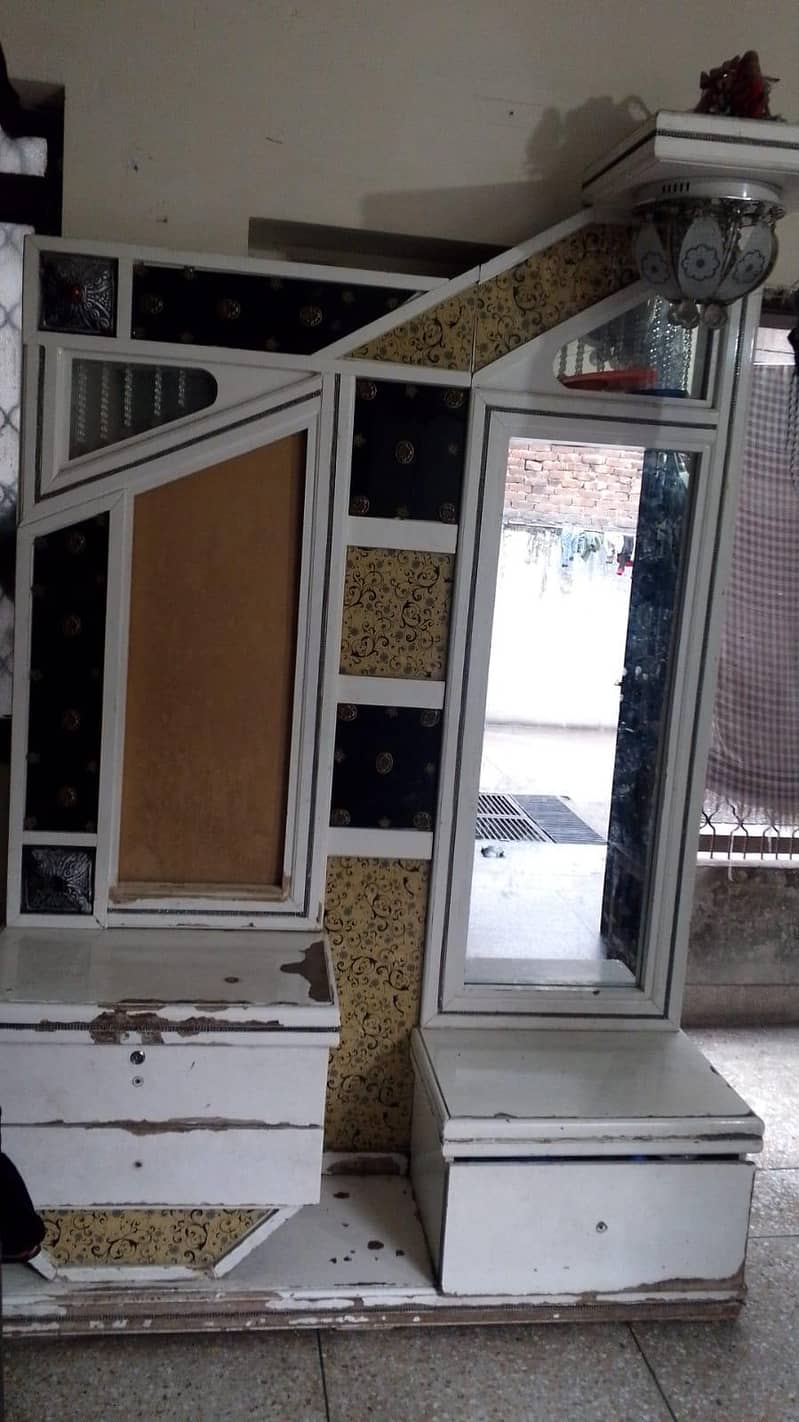 bed and dressing table. . 2