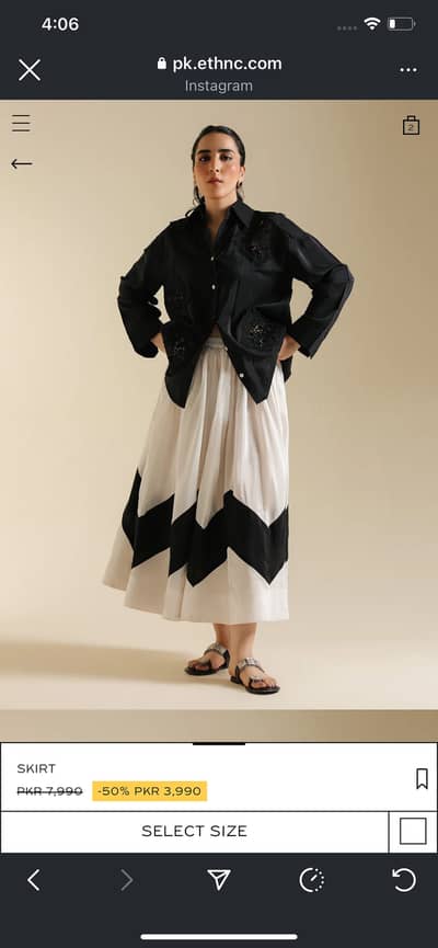 Black embroided top with skirt