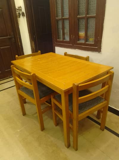 branded dining table. 4 seater solid wood