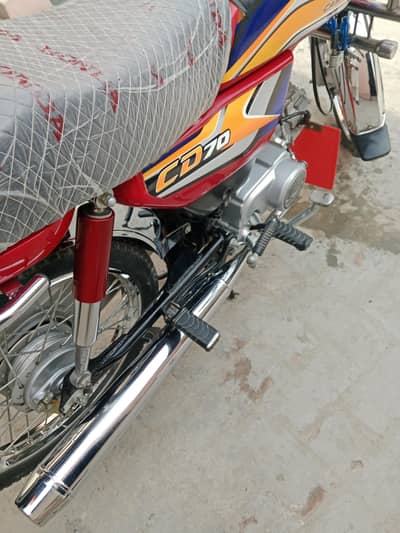 Honda CD 70 model 2025 red colour