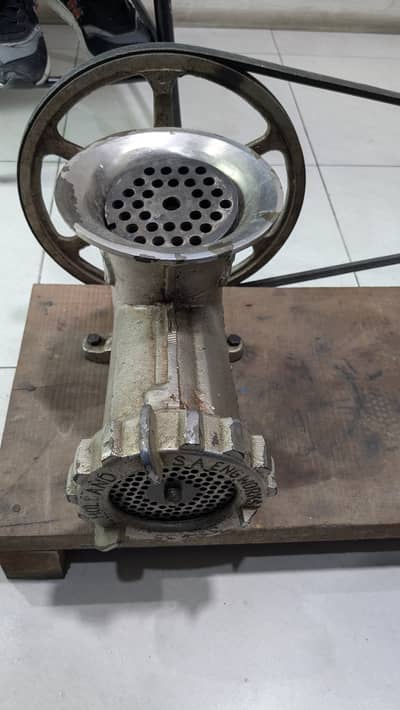 Three phase motor attached to meat grinder