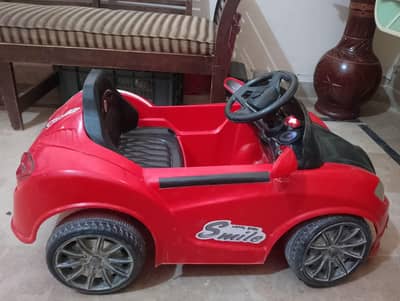 Red Kids’ Rechargeable Electric Car