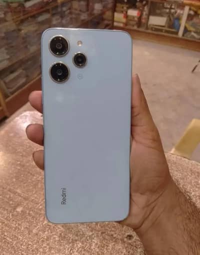 Redmi 12. . . . 4/128 with box and charger