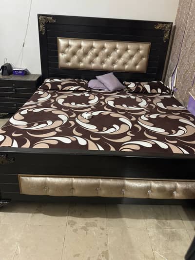 Bed. dressing with side.  two tables