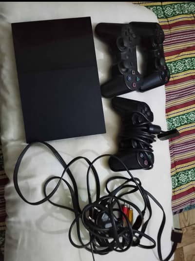playstation 2 with 3 controllers