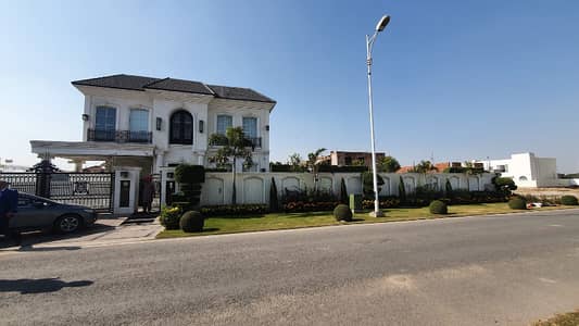 OWNER BUILD 2 KANAL (1-KANAL LAWN+1KANAL CONSTRUCTED) FULLY MAINTAINED SUPER HOT LOCATED BUNGALOW WITH SOLAR SYSTEM INSTALLED IS AVAILABLE IN THE BEST BLOCK OF PHASE 7 NEAR RAYA DHA LAHORE.