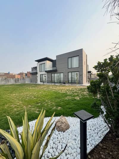 FULLY FURNISHED MODERN 2-KANAL (1+1) SUPER HOT LOCATED BUNGALOW WITH POOL AND THEATRE IS AVAILABLE IN THE BEST BLOCK OF DHA PHASE 6 LAHORE.