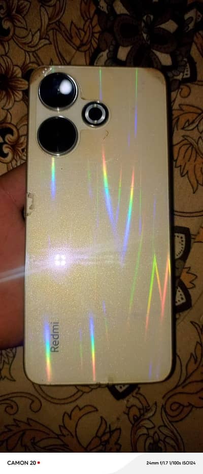 redmi 13 8/128 box charger available never opened 10/9