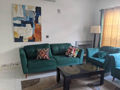 5 seater sofa set along with matching curtains and centre table