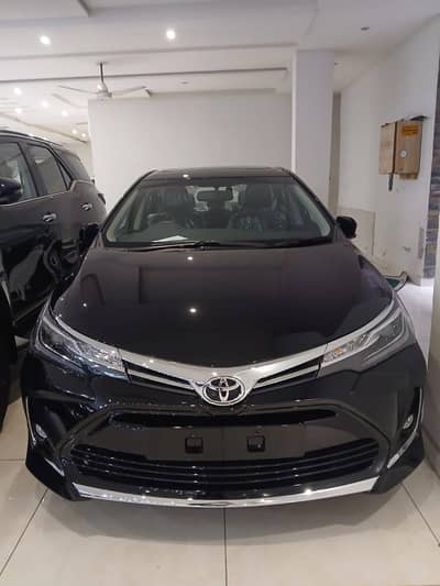 Toyota Corolla Altis Grande 1.8 2026 black with black zero metre